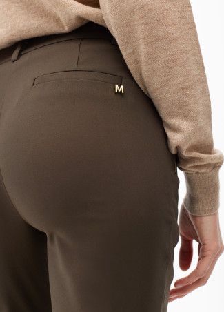 Stretch fabric trousers with zipped pocket