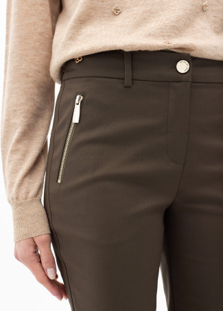 Stretch fabric trousers with zipped pocket