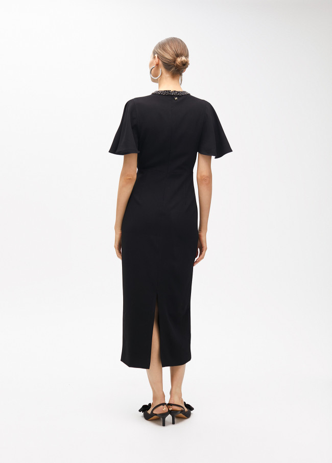 Dress with cape sleeves and a rhinestone collar