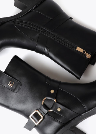 Heeled biker boots with metallic details