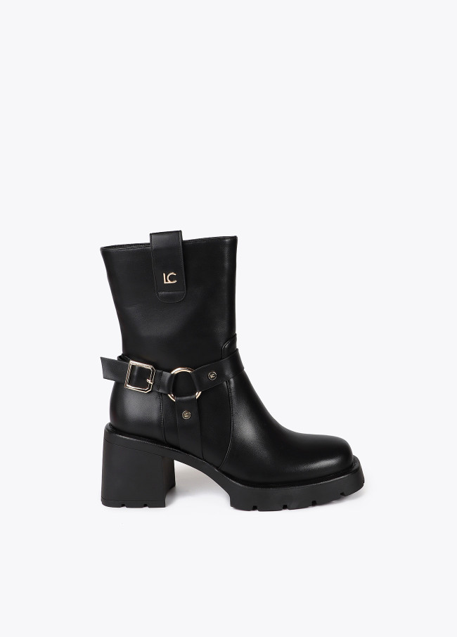 Heeled biker boots with metallic details