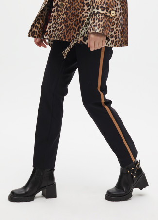 Heeled biker boots with metallic details