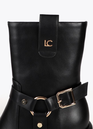 Heeled biker boots with metallic details