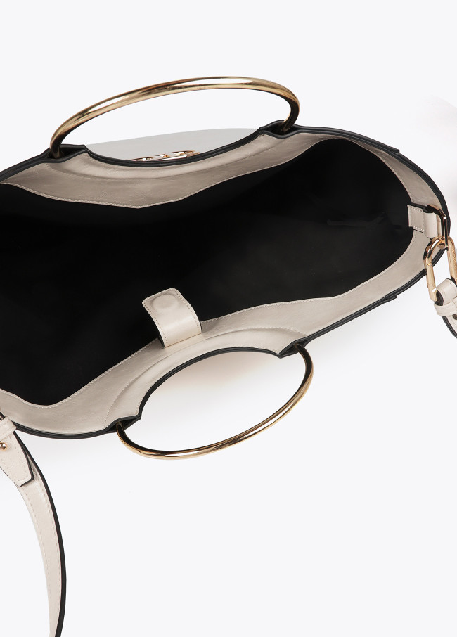 Faux leather tote bag with round metal strap...