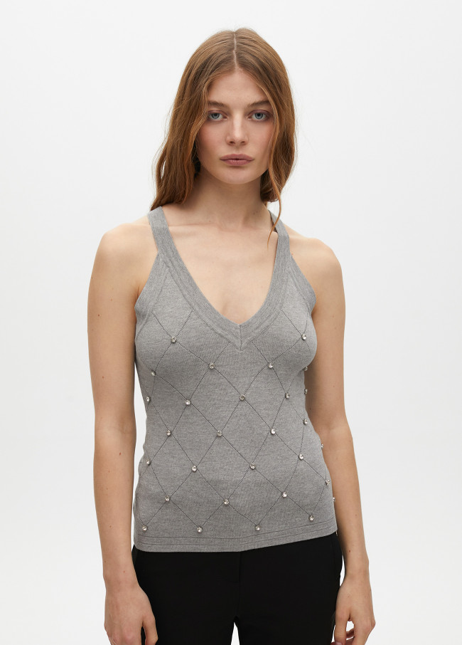Top with rhinestone detail