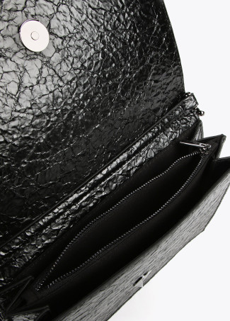 Crossbody bag with shiny faux leather flap and raised logo