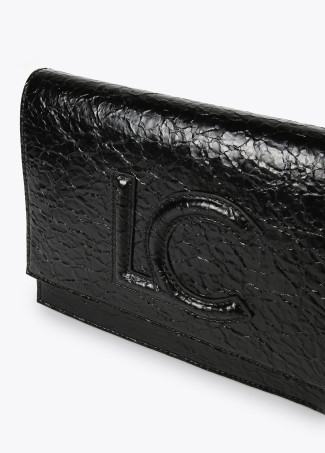 Crossbody bag with shiny faux leather flap and raised logo