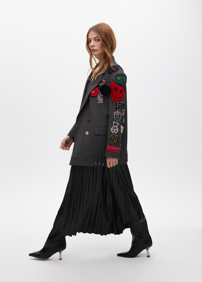 Pleated waxed-effect skirt