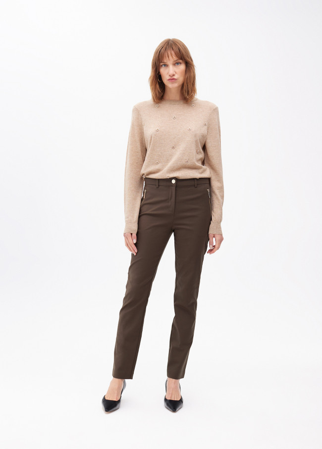 Pantalón elástico con bolsillo cremallera