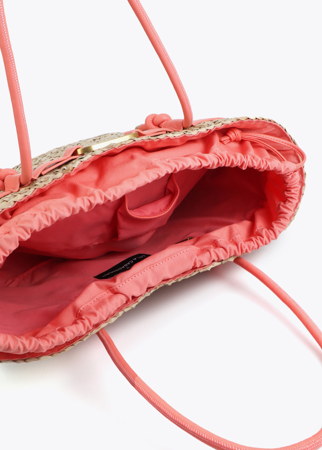 Basket with handles and faux leather details.