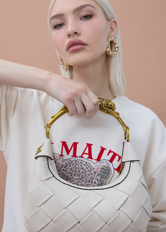 Borsa a mezza luna intrecciata con manico leopardo