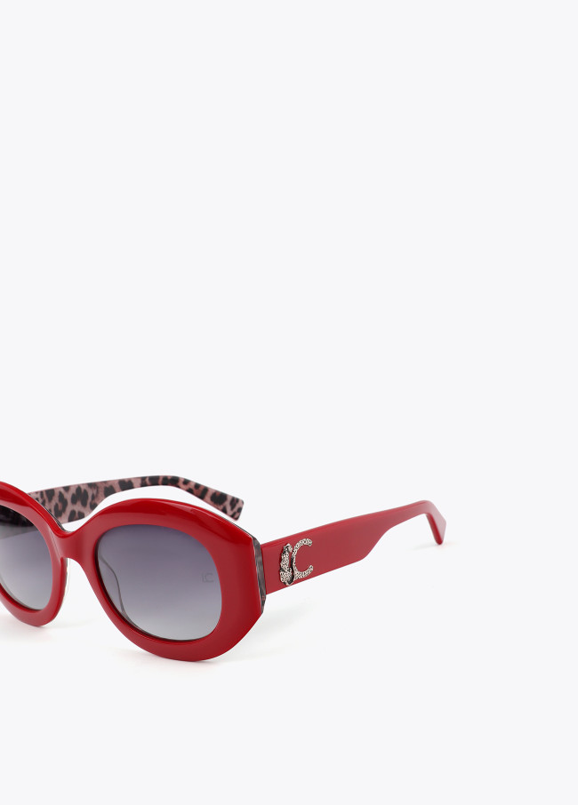 Runde Sonnenbrille mit Leoparden-Logo