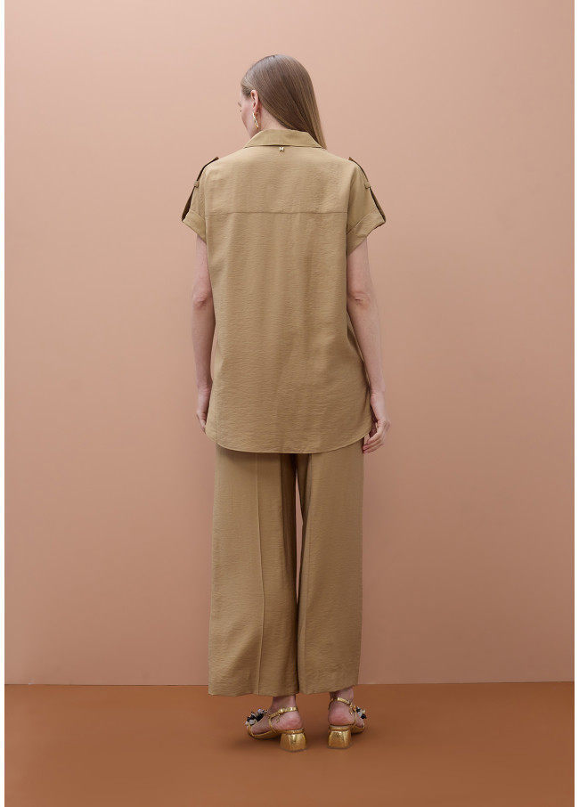 Chemise sans manches à poches