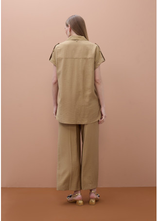 Chemise sans manches à poches