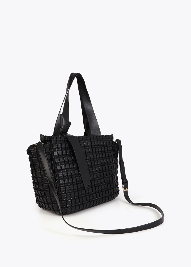 Sac en matériaux tressés avec détail nœud...