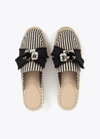 Flat sandal with raffia-effect sole in striped canvas fabric and bow detail