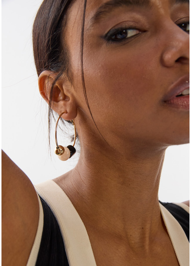 Boucles d'oreilles créoles avec détails en...