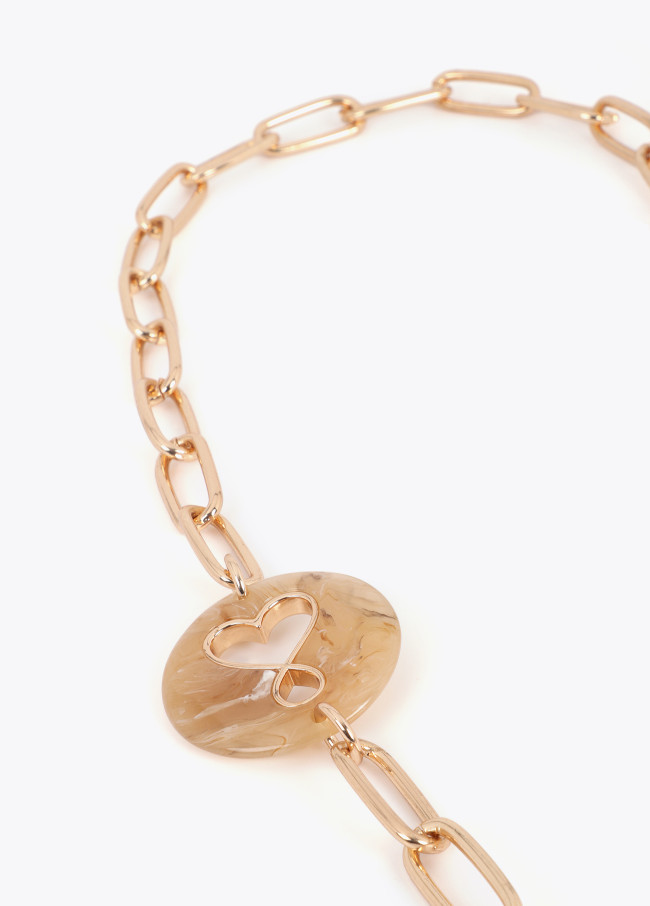 Collier long en acrylique avec médaillons...