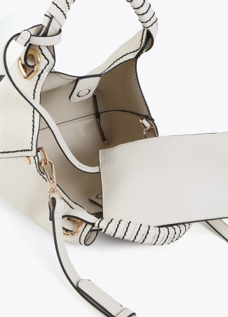 Small Crossbody Bag with Braided Strap and Metallic Details.