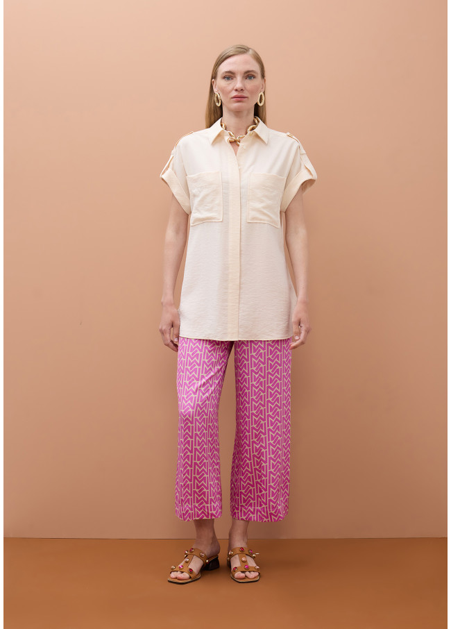 Chemise sans manches avec poches