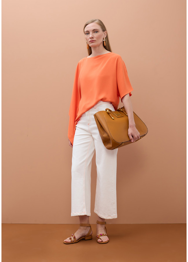 Blusa a mantella con manica scesa