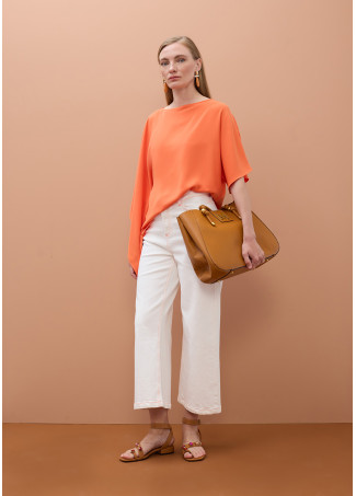 Blouse à manches cape