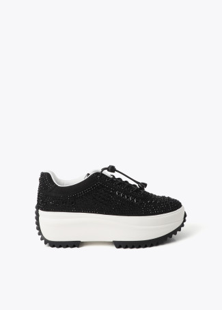 Sneakers con suola trasparente e applicazioni glitter