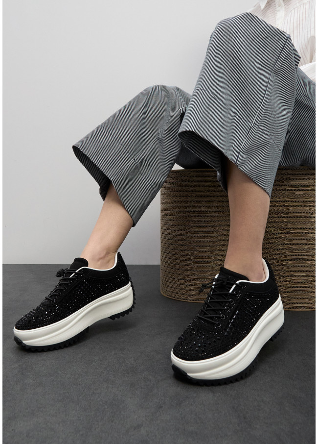Trainers with transparent sole and rhinestone...