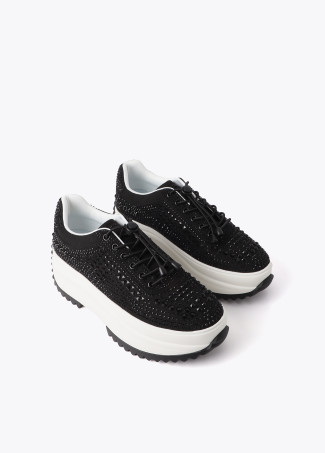 Trainers with transparent sole and rhinestone appliqués