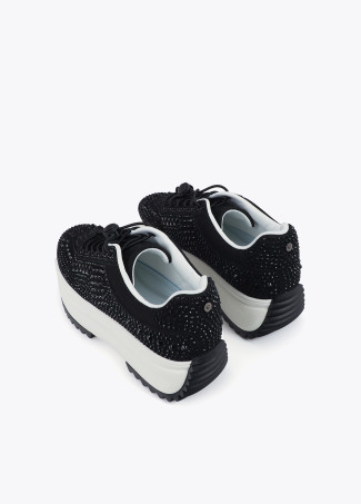 Sneakers con suola trasparente e applicazioni glitter