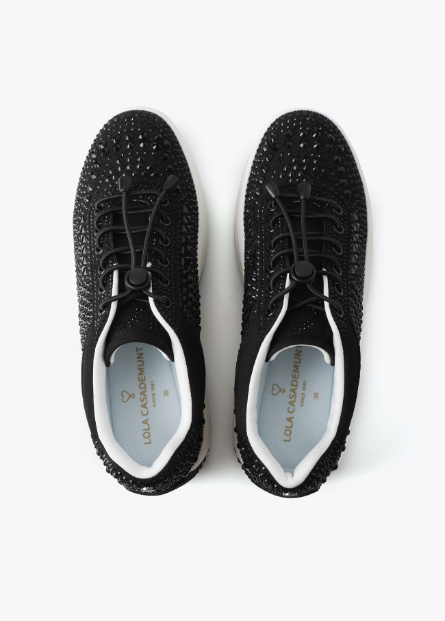 Trainers with transparent sole and rhinestone...