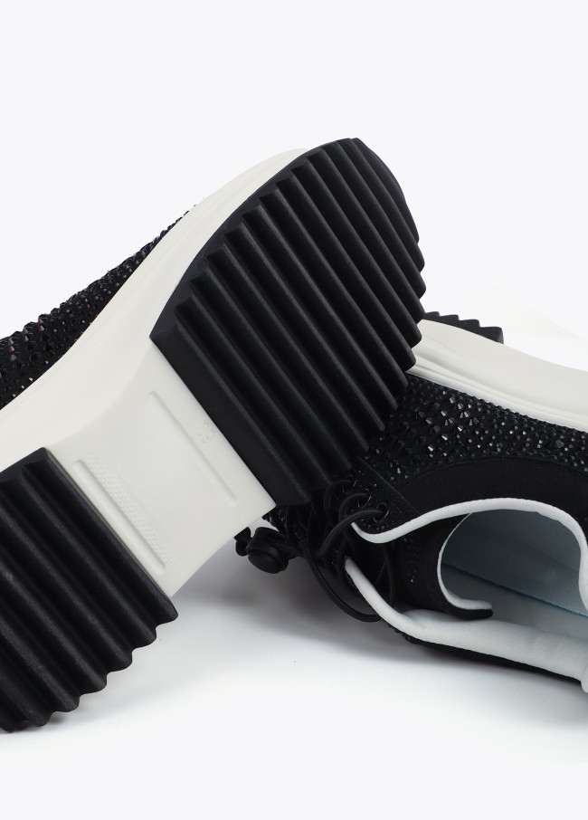 Trainers with transparent sole and rhinestone...