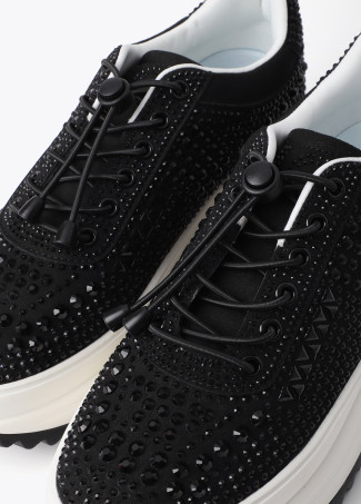 Sneakers con suola trasparente e applicazioni glitter