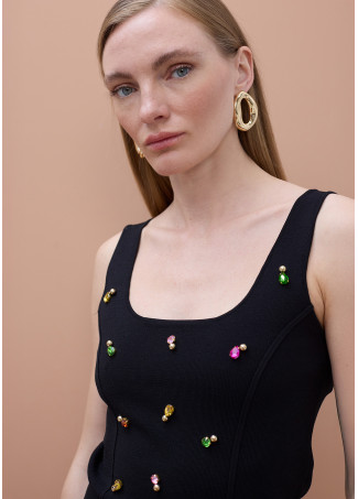 Top in Maglia con Gioielli