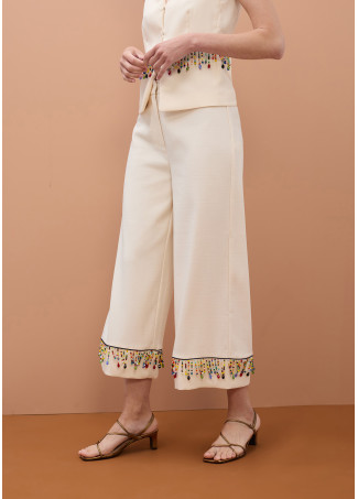 Pantalon court avec pierres multicolores
