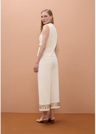 Pantaloni cropped con pietre multicolori