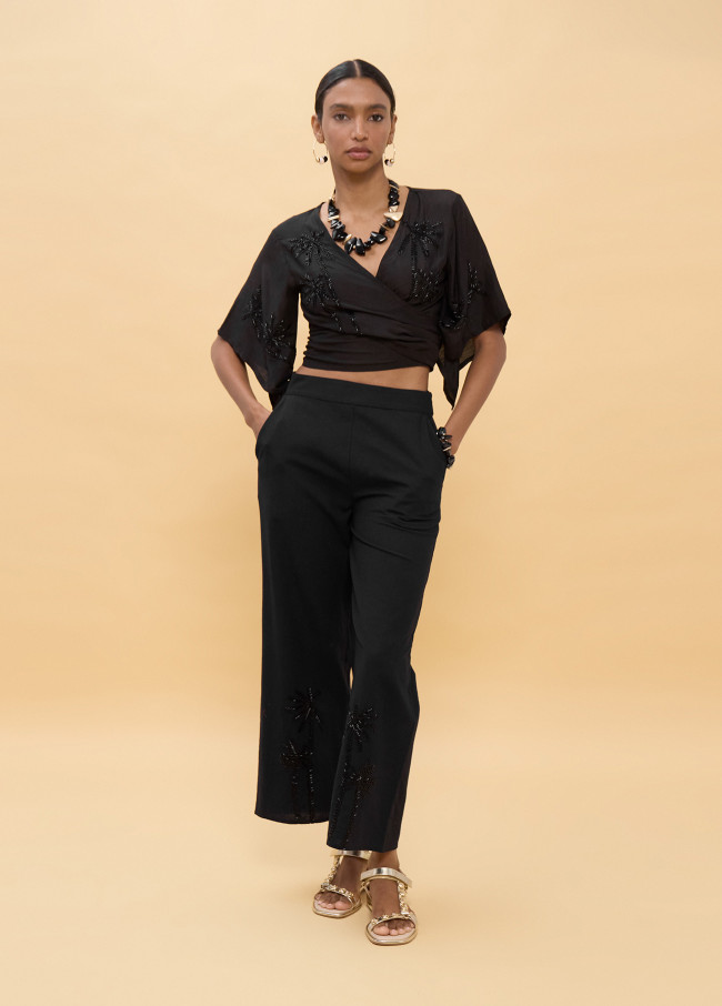 Pantalón negro palmeras bordadas