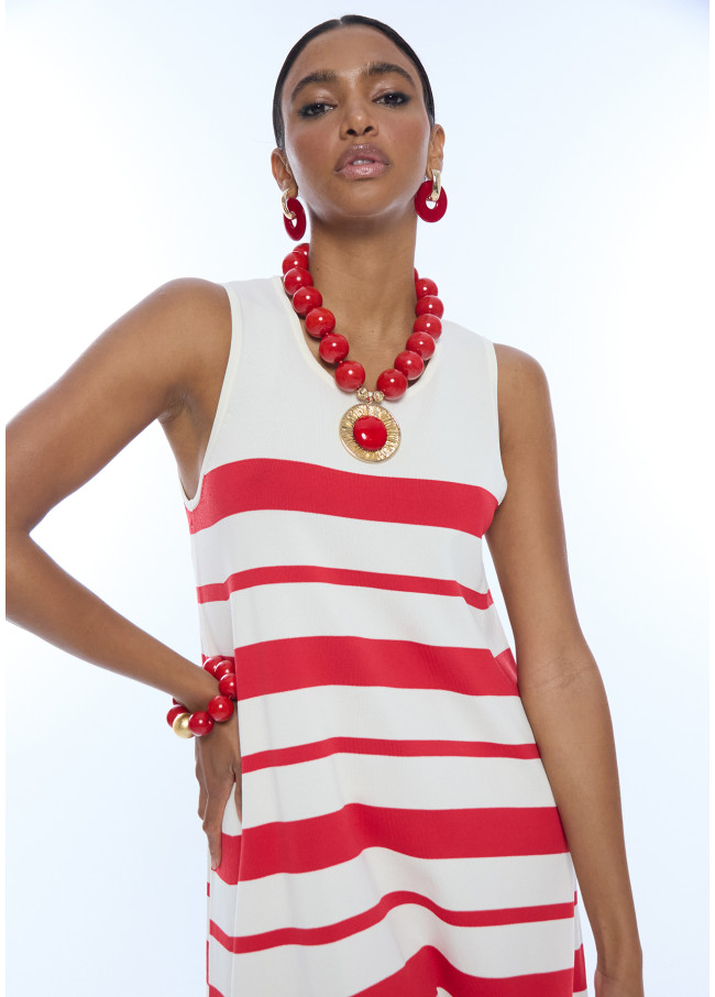 Robe en maille courte à larges bretelles évasée...