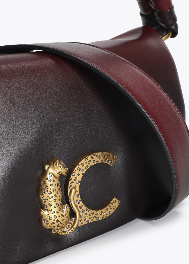 Sac à bandoulière avec rabat et anse nouée....