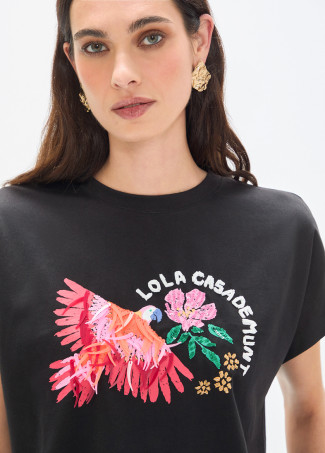Camiseta loro con plumas