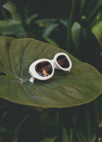 Runde Sonnenbrille mit Leoparden-Logo