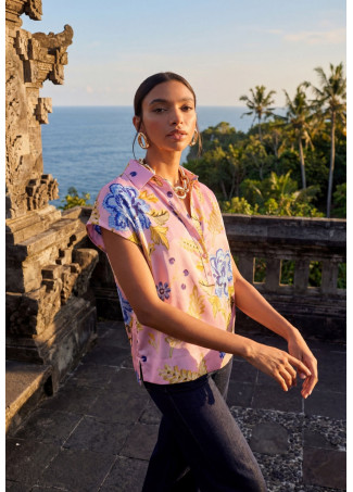 Blusa a collo polo con stampa floreale