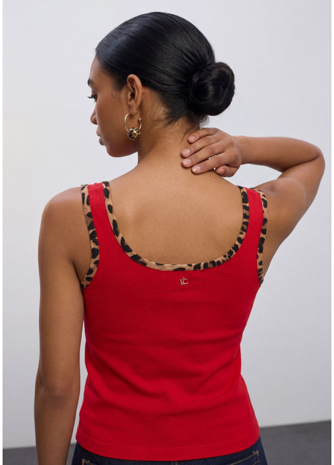 Top con rib a contraste animal print