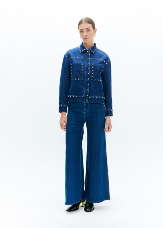 Jean flare avec clous à la taille et poches avant