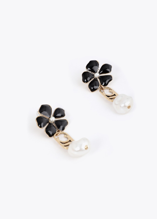 Boucles d'oreilles longues fleur, logo ovale et...