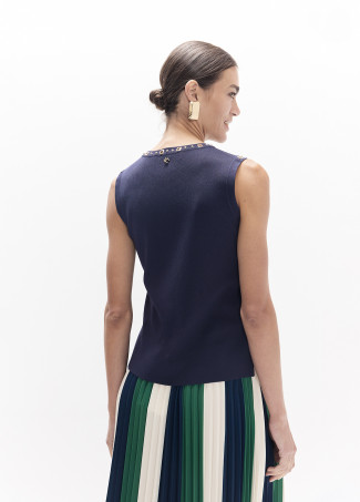 Top con borchie rotonde e quadrate