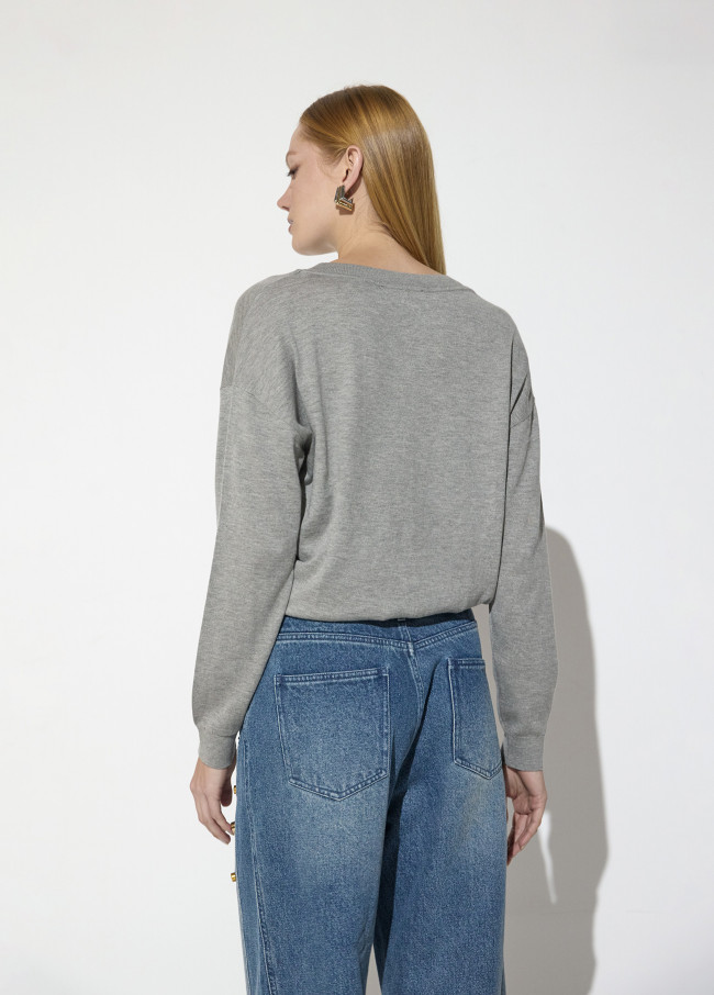 Maglione con cristalli