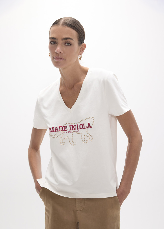 Maglietta con scollo a v con spacchi laterali e...