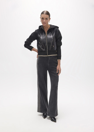 Sweat ouvert noir avec paillettes devant en trois couleurs, côtelé avec détails en lurex