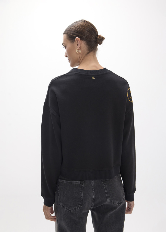 Sudadera leopardo cristales dorados